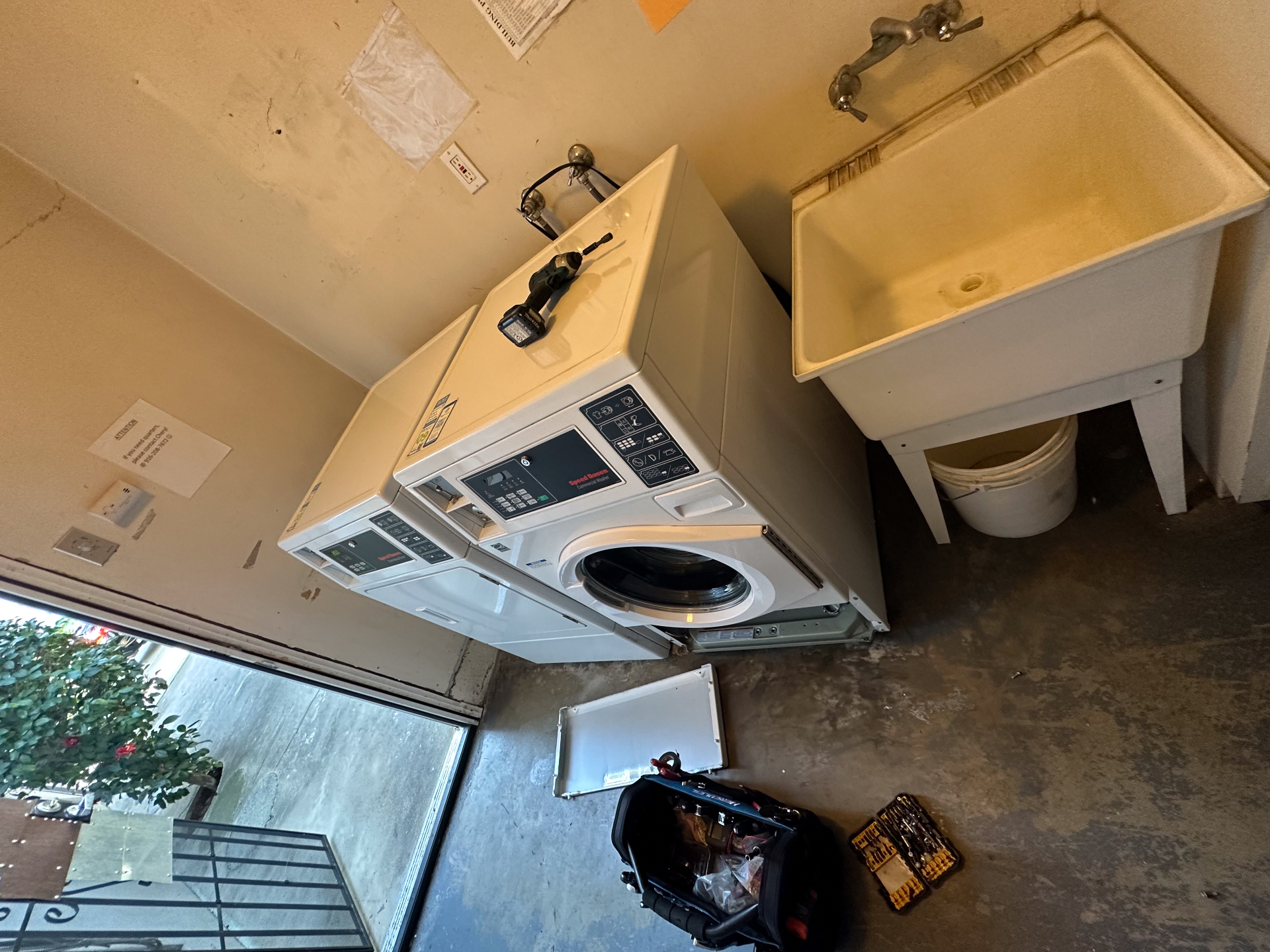 Dr. Appliance certified technician repairing a household appliance